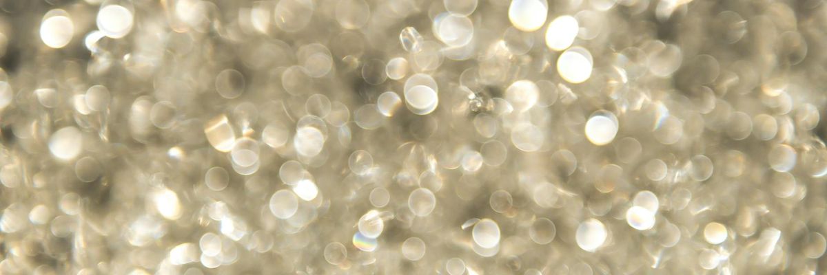 Wide abstract pattern with glowing particles